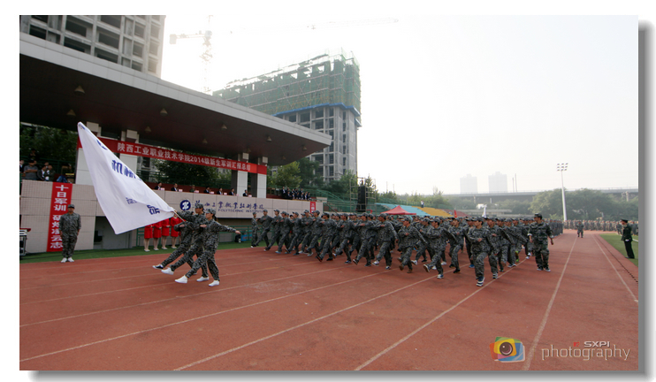 我院举行2014级新生军训汇报总结大会